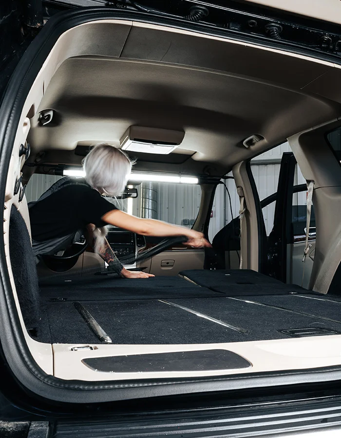 worker-woman-vacuum-cleaning-dust-interior-inside